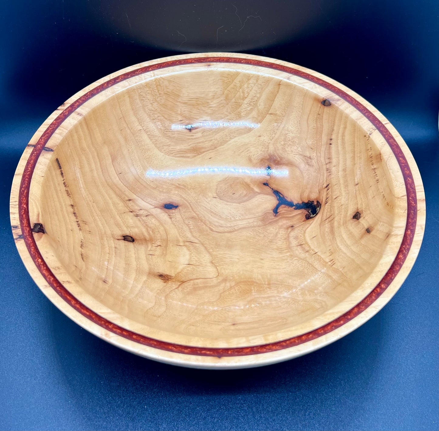 Hand turned Elm bowl with deep copper colored resin inlay