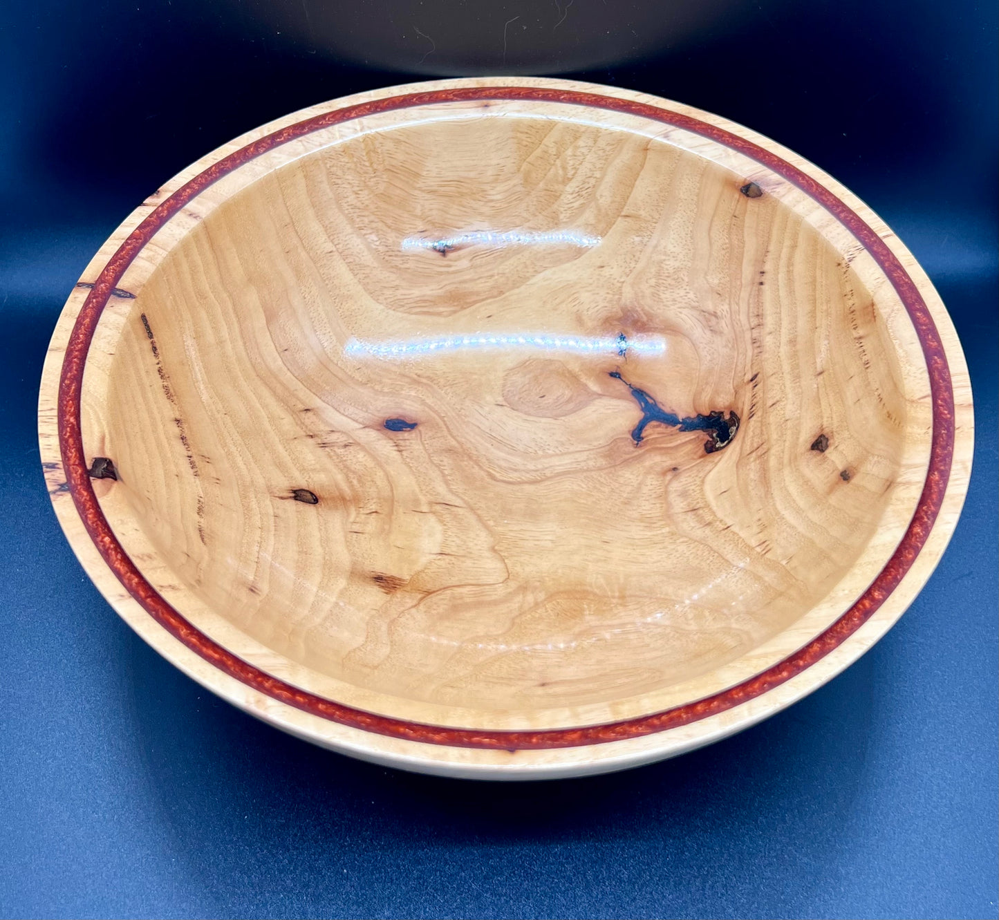 Hand turned Elm bowl with deep copper colored resin inlay
