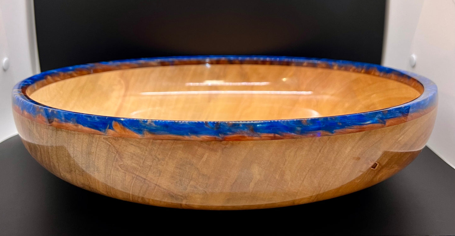 Hand turned curly Maple Bowl with Blue and Gold rim