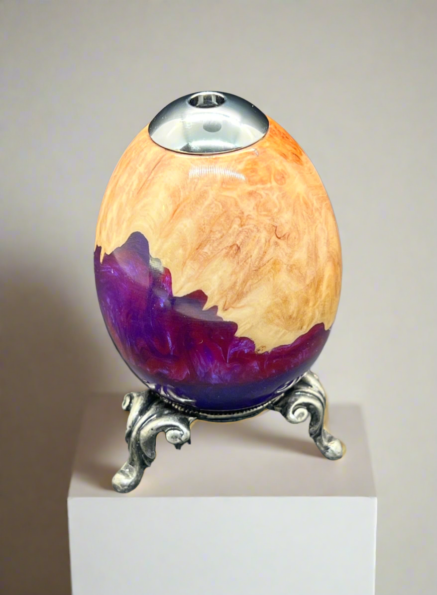 Hand turned Kaleidoscope Egg on a Pewter stand.