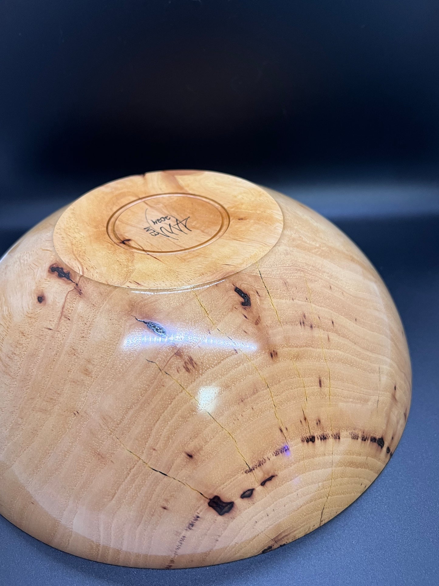 Hand turned Elm bowl with deep copper colored resin inlay