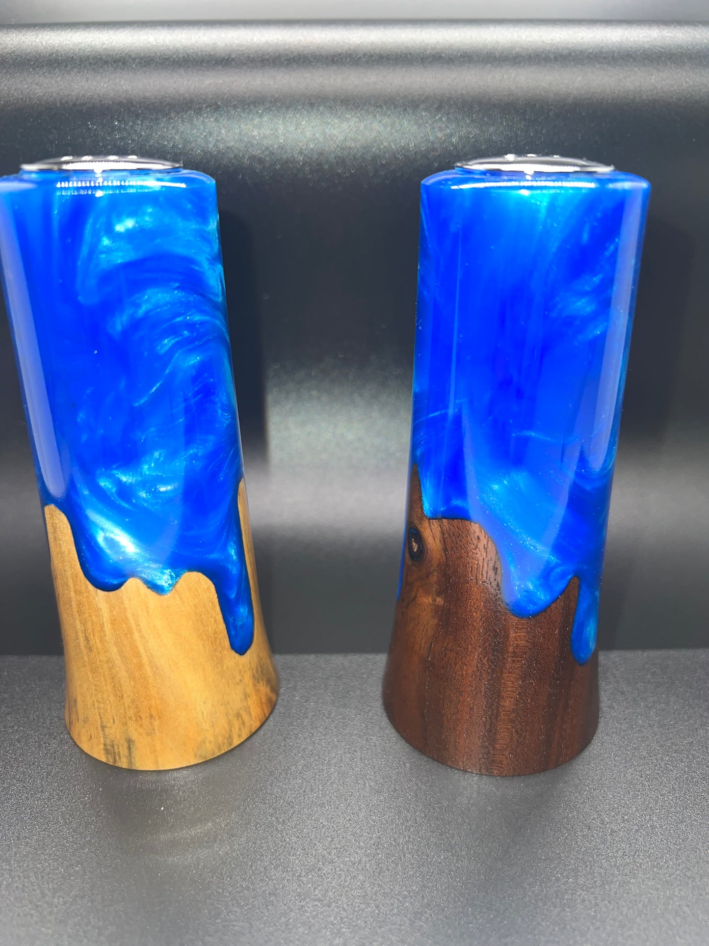 Salt and Pepper shaker set.
Burl wood and resin.
Maple and Walnut wood with blue resin.