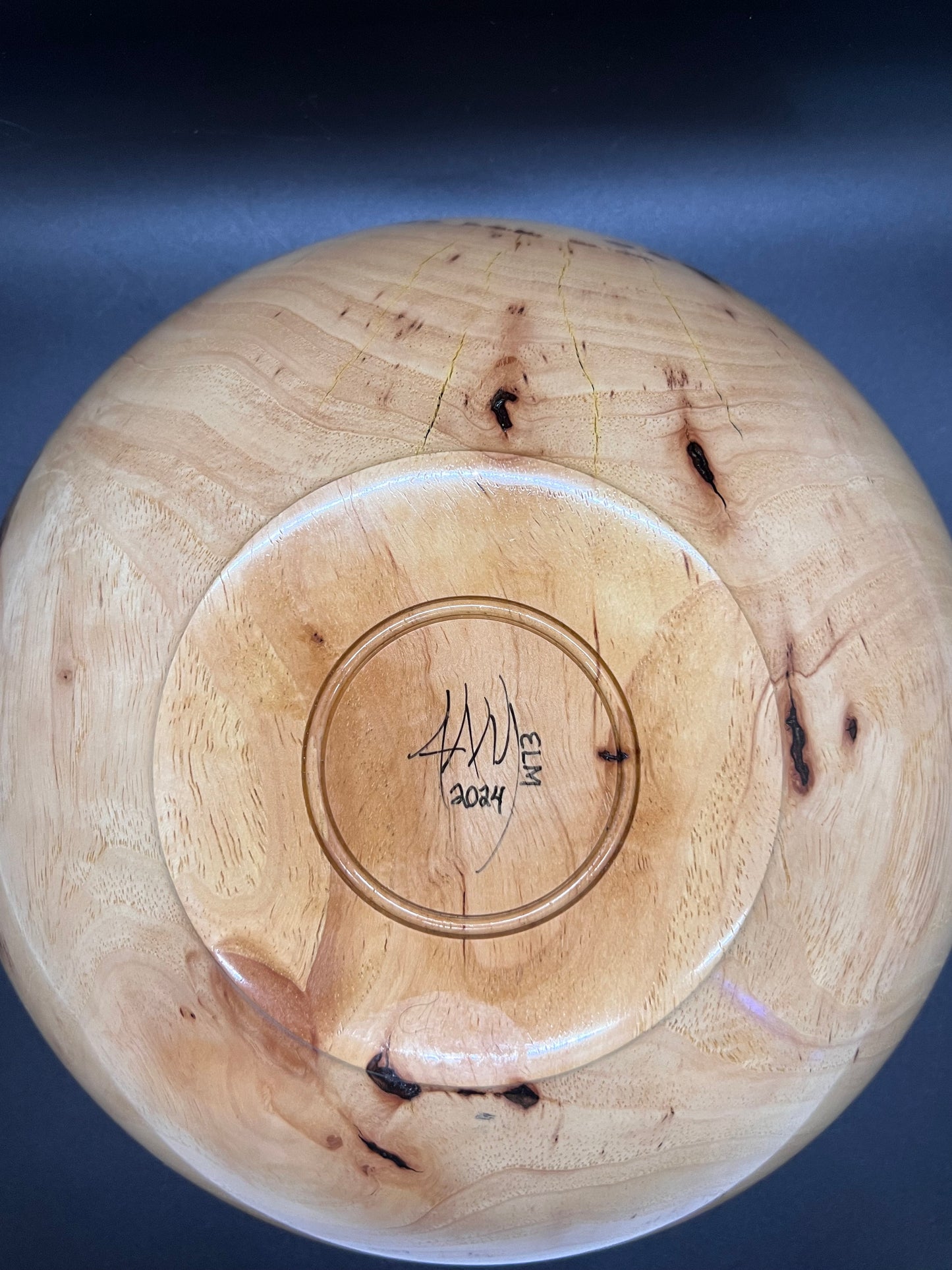 Hand turned Elm bowl with deep copper colored resin inlay