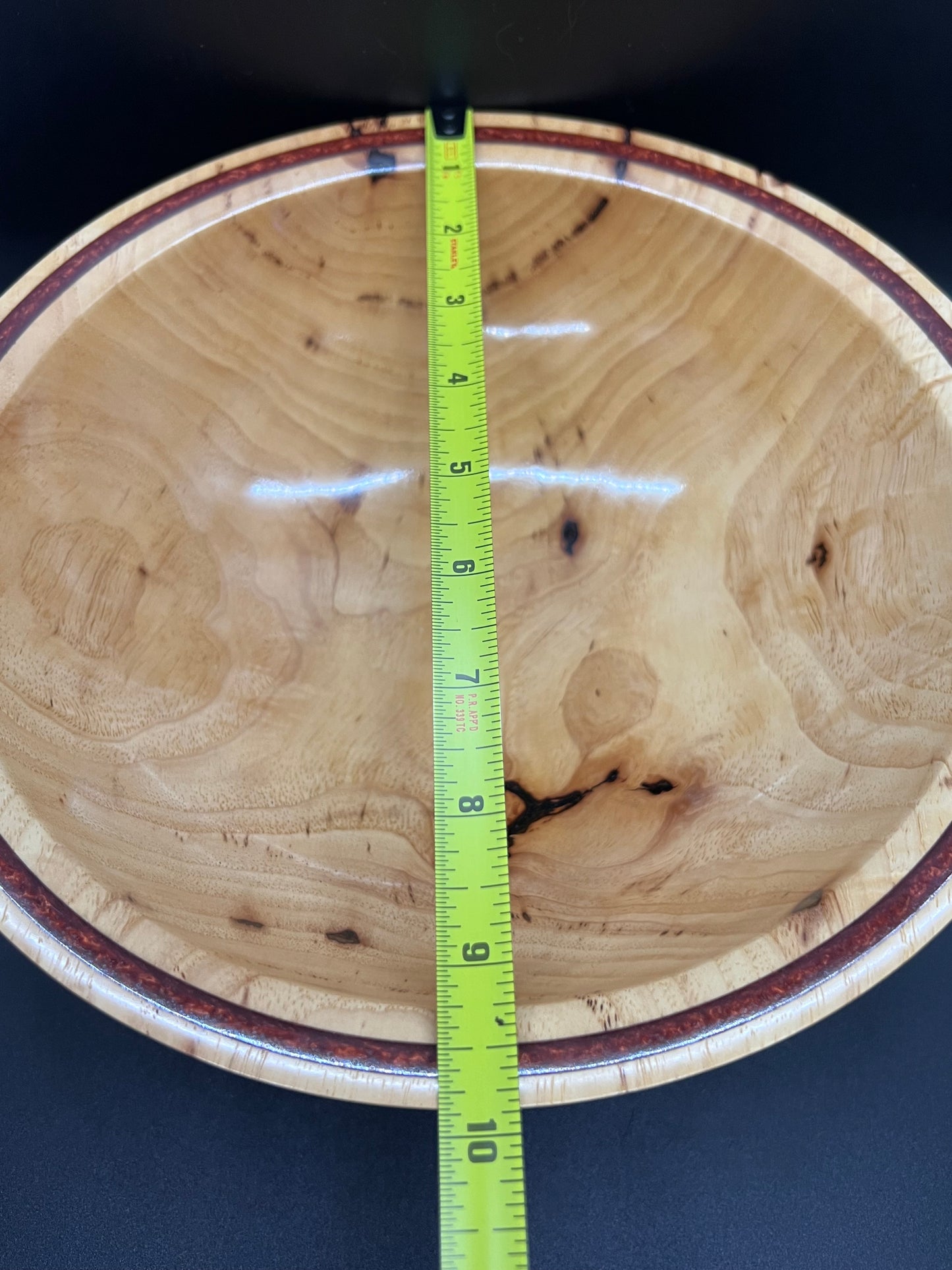 Hand turned Elm bowl with deep copper colored resin inlay