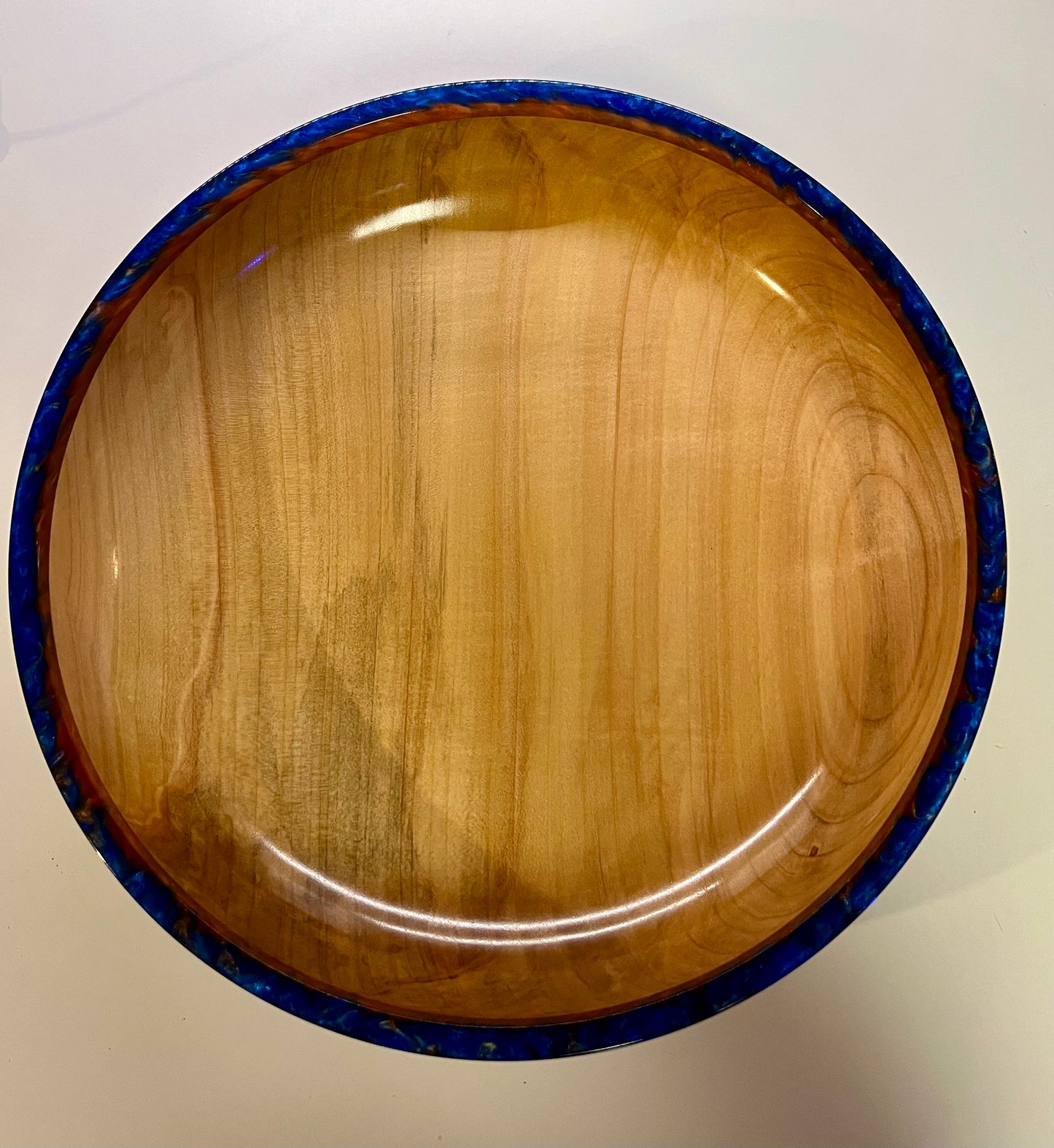 Hand turned curly Maple Bowl with Blue and Gold rim