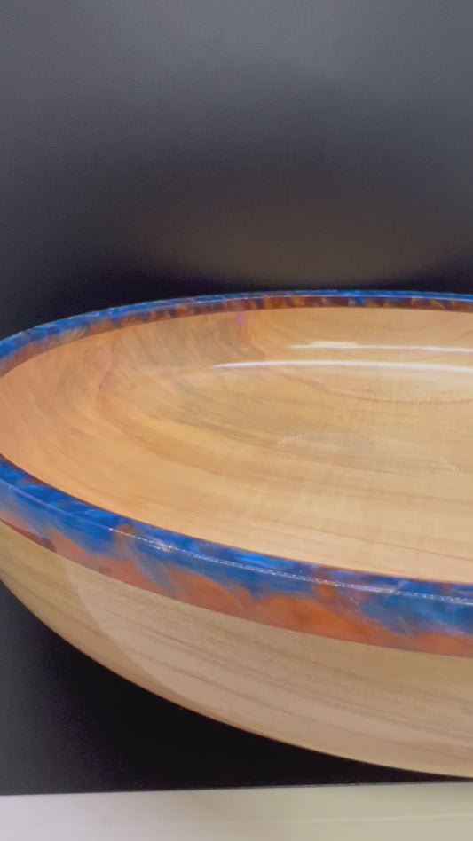 Hand turned curly Maple Bowl with Blue and Gold rim